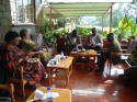 We are sitting on the veranda of Anna and Thomas Ngeno's home eating a delicious lunch.  Left to right are Ruth Wasawo, Anna, Saina, Thomas, and Dr. David Wasawo.